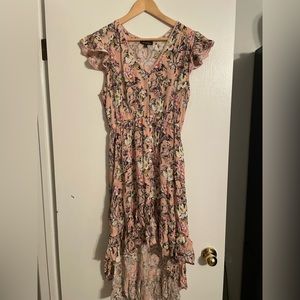 Cap Sleeve pink floral dress, cut high in the front low in the back.